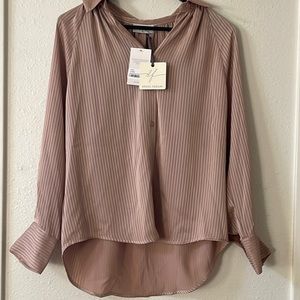Never worn silky dress shirt. Tags still on it. Size small. Mauve color.